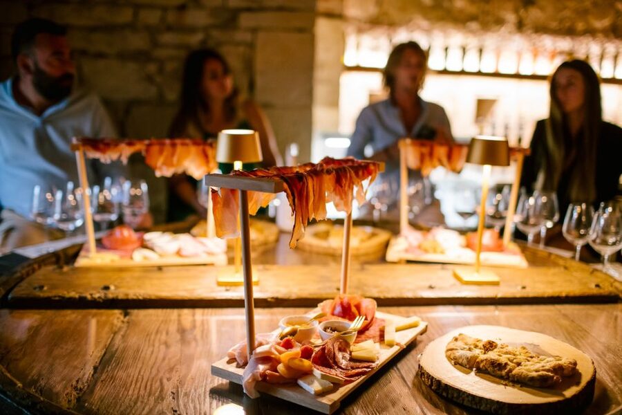 Pastrengo: Lake Garda Wine & Food Tasting in Historic Fort - Arriving at the brown gate and golden eagle