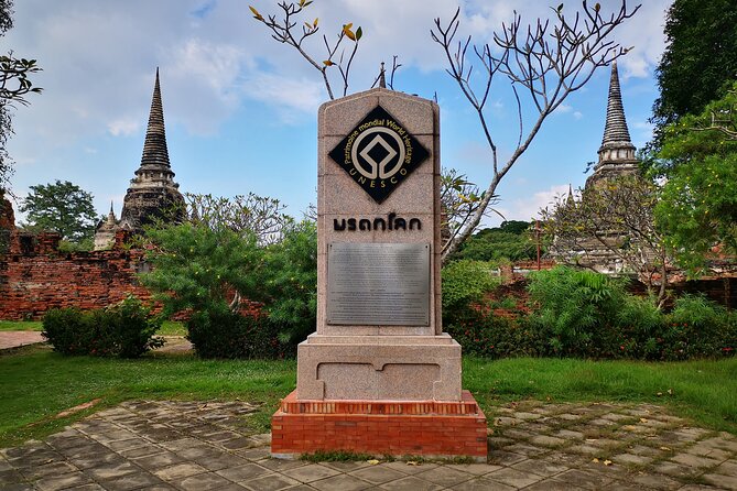 Private Excursion to Ayutthaya, UNESCO World Heritage site with Boat Tour - Wat Mahathat and the Buddha head in the tree