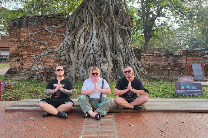 Private tour to Ayutthaya and Boat Tour Heritage Site - Wat Mahathat and the Buddha head in tree roots