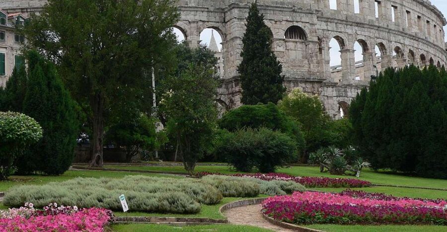 Pula: Historic Walking Tour with Local Guide & City Views - Following the old streets beyond the Arena