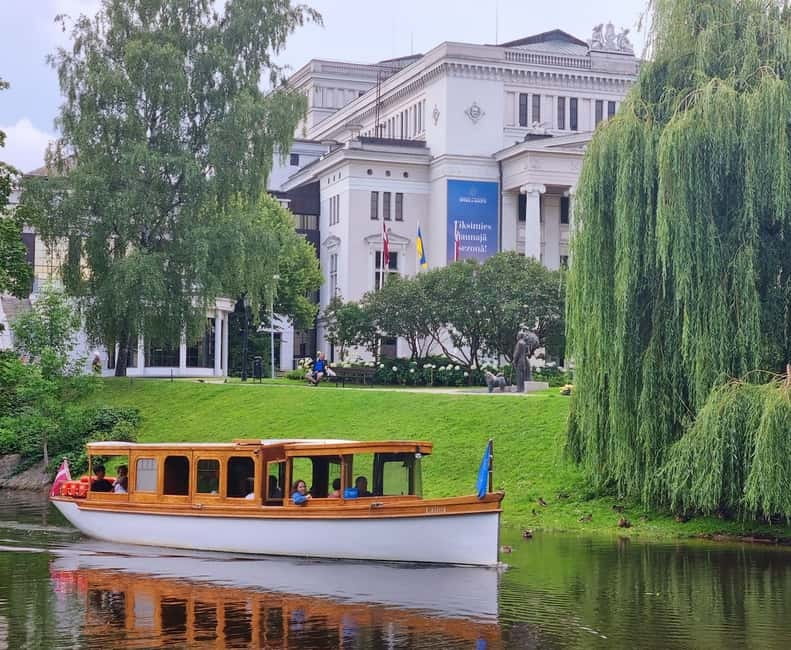 Riga: Canal & Daugava Cruise on a Historic Wooden Boat - The National Library and the wide Daugava River