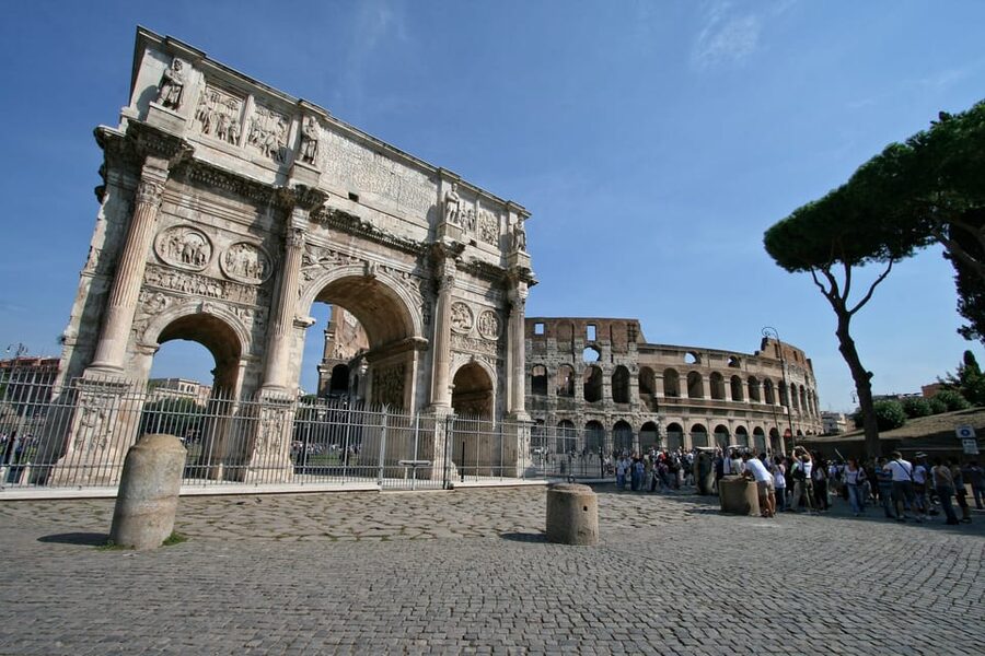 Rome: Colosseum and Ancient Rome Guided Walking Tour - Walking through the Roman Forum