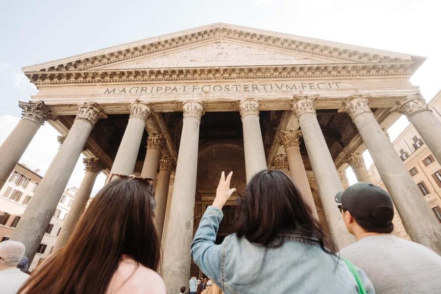 Rome: Colosseum, Vatican Museums & Historic Center in a Day - Entering the Colosseum with a guide