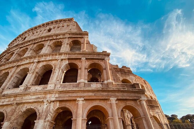 Rome: Colosseum with Arena, Roman Forum and Palatine Guided Tour - Walking through the Roman Forum