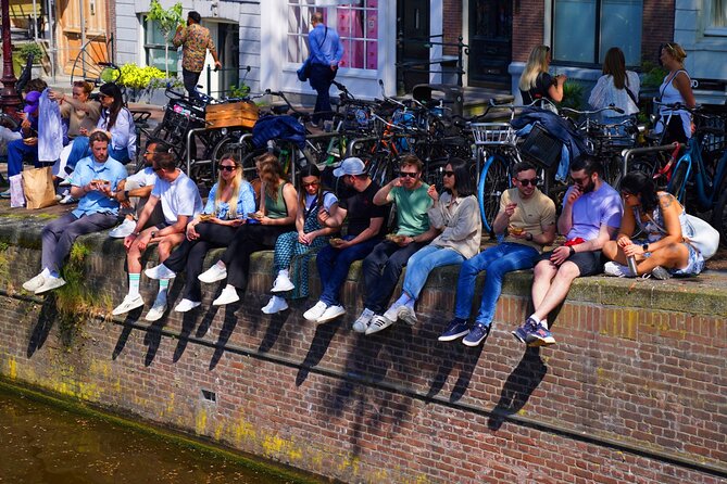 Skipping Lines & Sipping Beers: A History Tour of Amsterdam - Beursplein and the oldest central streets