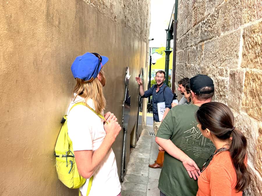 Sydney Convicts, History & The Rocks 2.5-Hour Walking Tour - Entering The Rocks through old lanes and sandstone walls