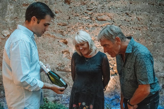 Valencia Old Town Tour with Wine & Tapas in 11th Century Historic Monument - Plaza de la Reina and the city’s grand public spaces